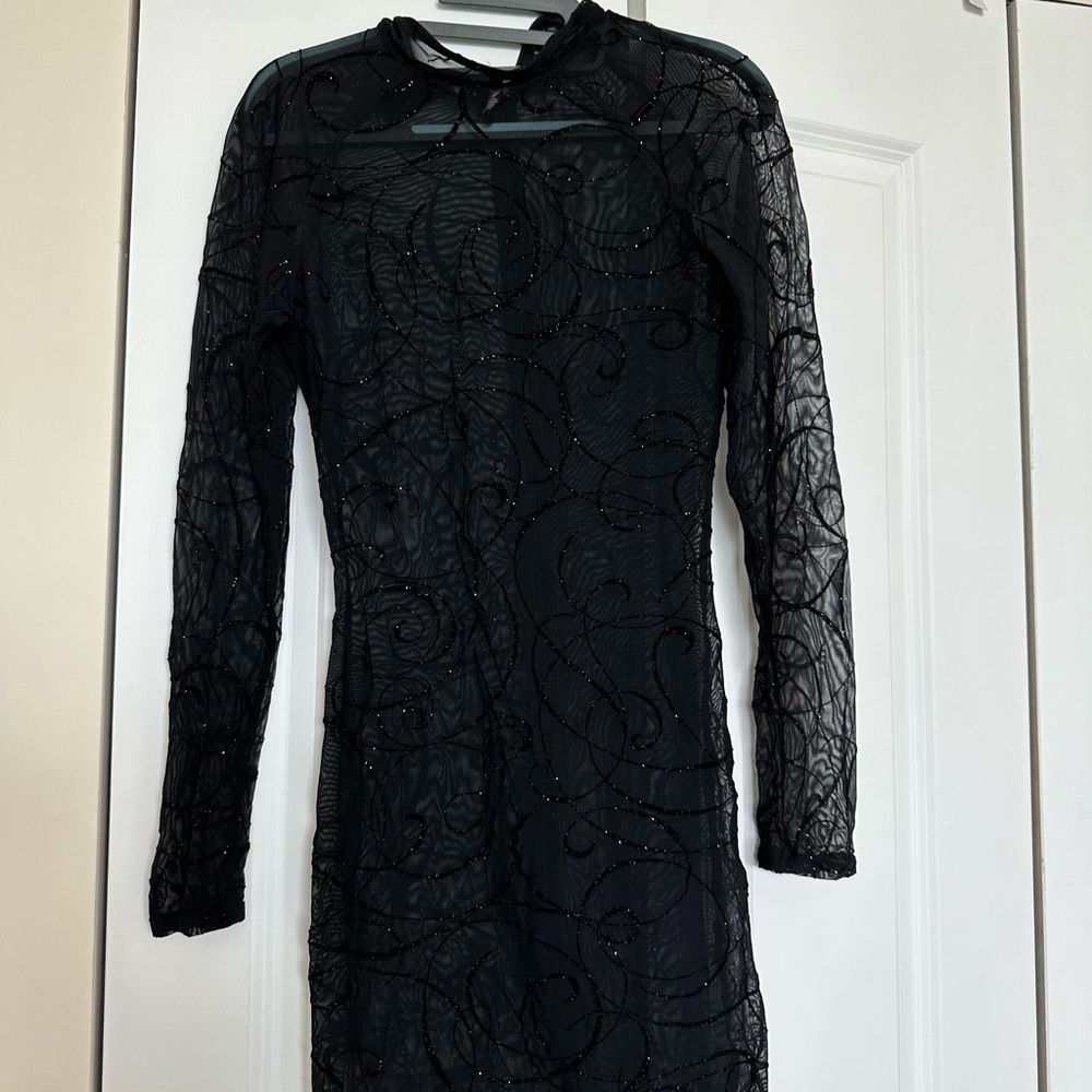Shear dress. With stretch